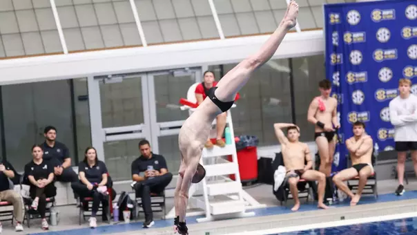Nigel Chambers dives into the water