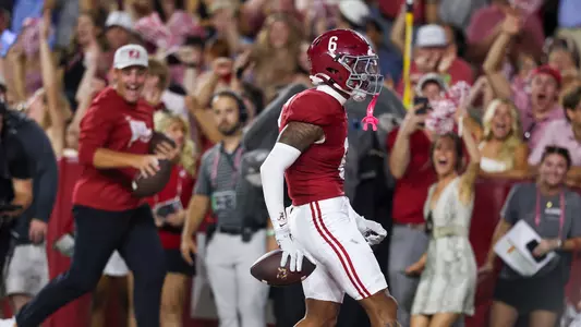 Red Morgan returning an interception for a touchdown
