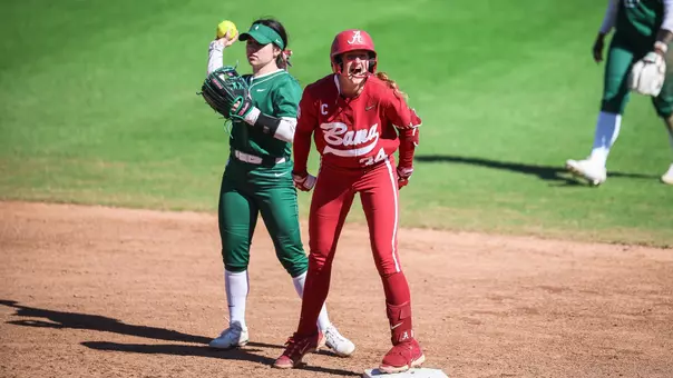 Marlie Giles (34) celebrates as second base after an RBI double vs. Dartmouth (Feb. 22, 2026)
