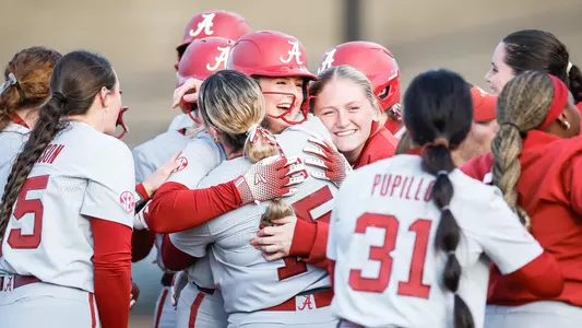 Ambrey Taylor (36) celebrates with teammates after a two-run double vs. UAB (Feb. 24, 2026)