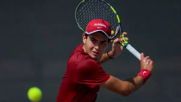 Carlos Gimenez Perez hits the ball
