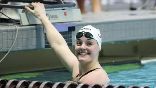 Tessa Giele smiles in pool