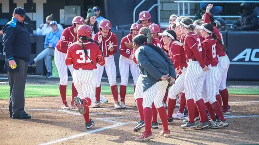 Alabama softball players await Alexis Pupillo (31) at home plate following a grand slam vs. Villanova (Feb. 5, 2026)
