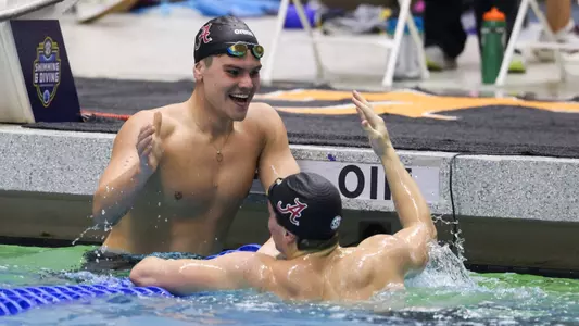 Leonardo Alcantara and Tommy Hagar high five