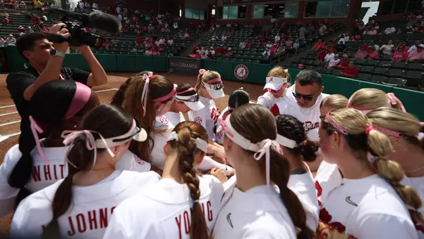 Alabama softball players huddle pregame vs. Arkansas (March 15, 2026)
