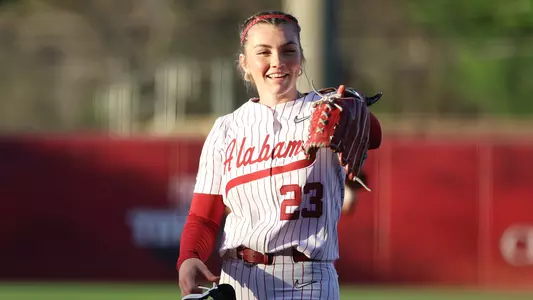 Jocelyn Briski (23) points and smiles at a teammate vs. Arkansas (March 13, 2026)