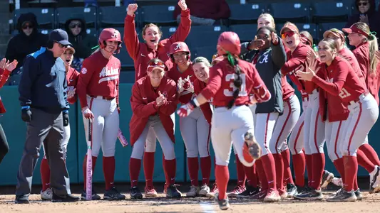 Alabama softball players celebrate at home plate after an Alexis Pupillo (31) home run vs. ULM (March 17, 2026)