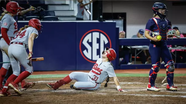 Alexis Pupillo (31) celebrates as she slides into home against Ole Miss (March 6, 2026)