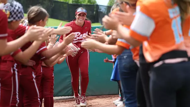 Ana Roman (21) high fives kids during starting lineups vs. Kentucky (April 19, 2026)