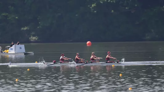 Rowing v4 boat at Lake Wheeler