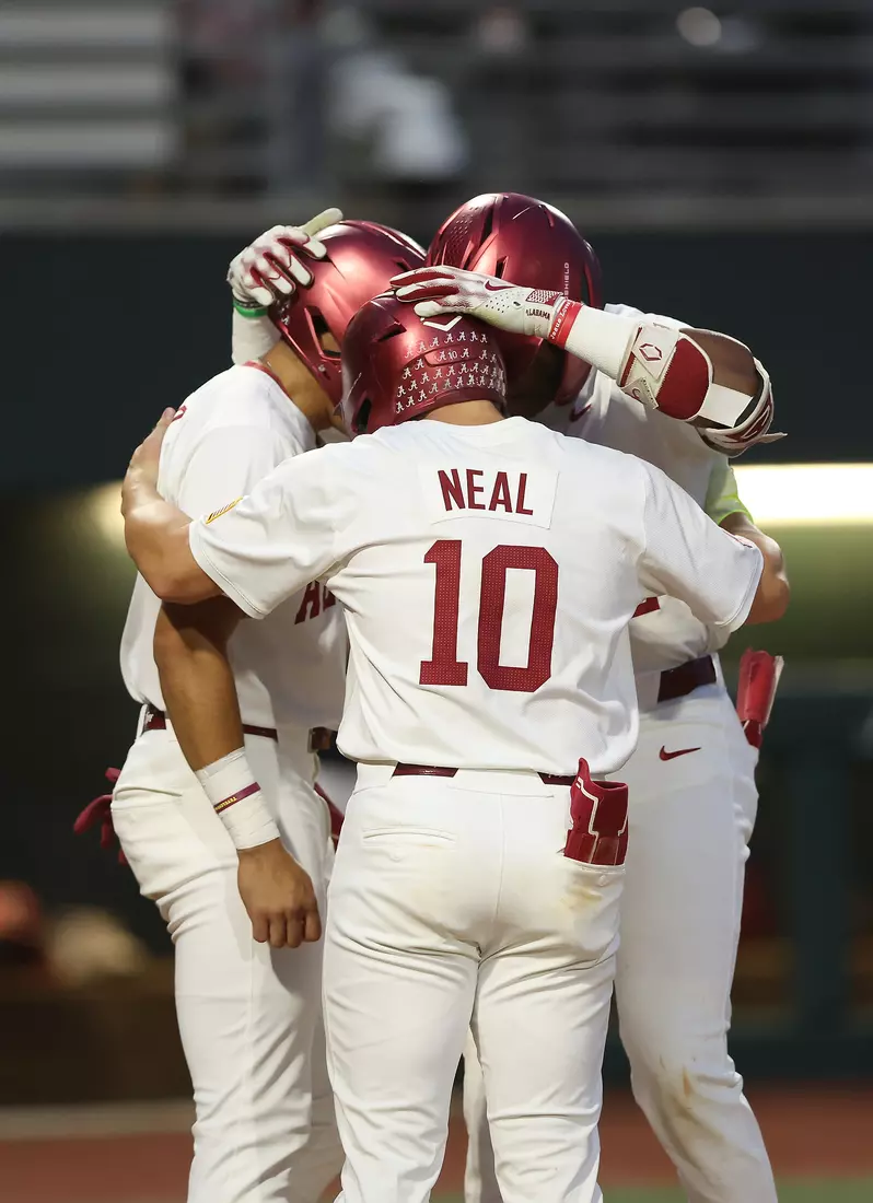 Alabama Baseball Players Justin Lebron (1), Brady Neal (10) and Alabama Baseball Player Eric Hines (42) celebrate against Vanderbilt at Sewell-Thomas Stadium in Tuscaloosa, AL on Thursday, Apr 30, 2026.