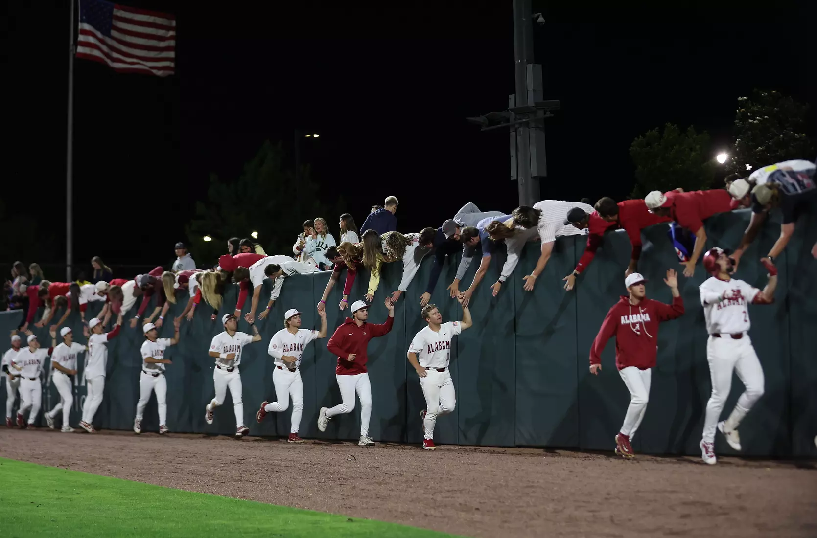Alabama Baseball celebrates John LemmÕs (33) walk off homerun against Vanderbilt at Sewell-Thomas Stadium in Tuscaloosa, AL on Thursday, Apr 30, 2026.