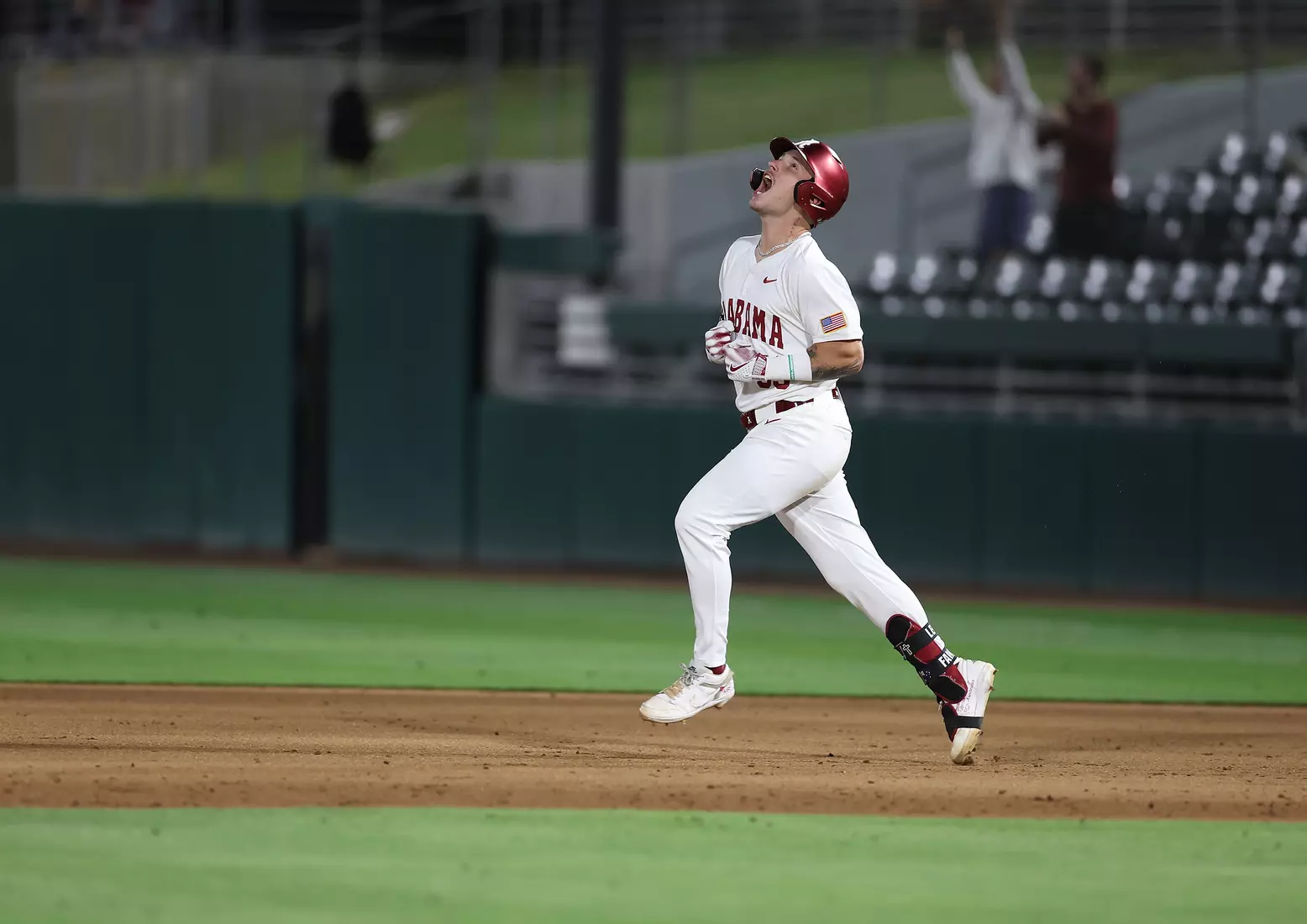 Alabama Baseball Player John Lemm (33) celebrates a walk off home run against Vanderbilt at Sewell-Thomas Stadium in Tuscaloosa, AL on Thursday, Apr 30, 2026.