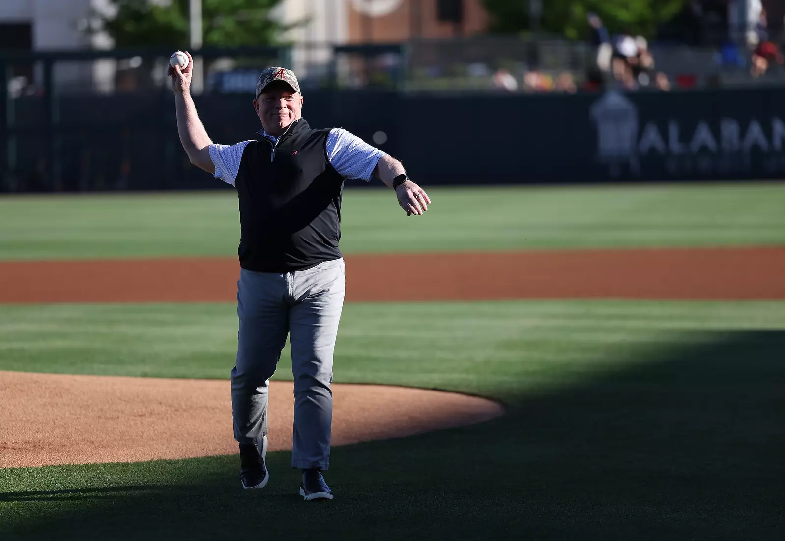 A veteran throws the first pitch during pre game against Ole Miss at Sewell-Thomas Stadium in Tuscaloosa, AL on Thursday, May 14, 2026.