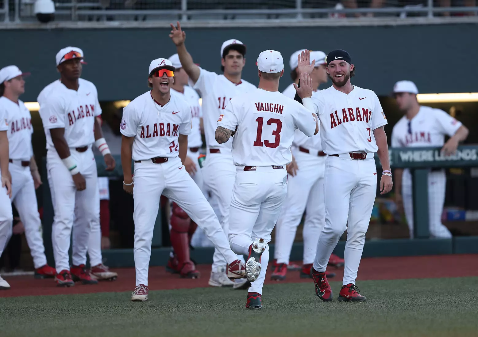 Alabama Baseball Player Luke Vaughn (13) celebrates with his teammates against Ole Miss at Sewell-Thomas Stadium in Tuscaloosa, AL on Thursday, May 14, 2026.