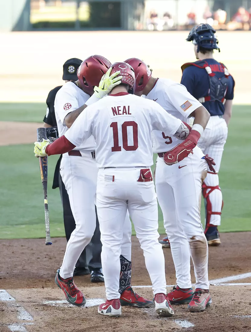 Alabama Baseball Player Justin Lebron (1), Alabama Baseball Player Brady Neal (10) and Alabama Baseball Player Bryce Fowler (9) celebrate against Ole Miss at Sewell-Thomas Stadium in Tuscaloosa, AL on Thursday, May 14, 2026.