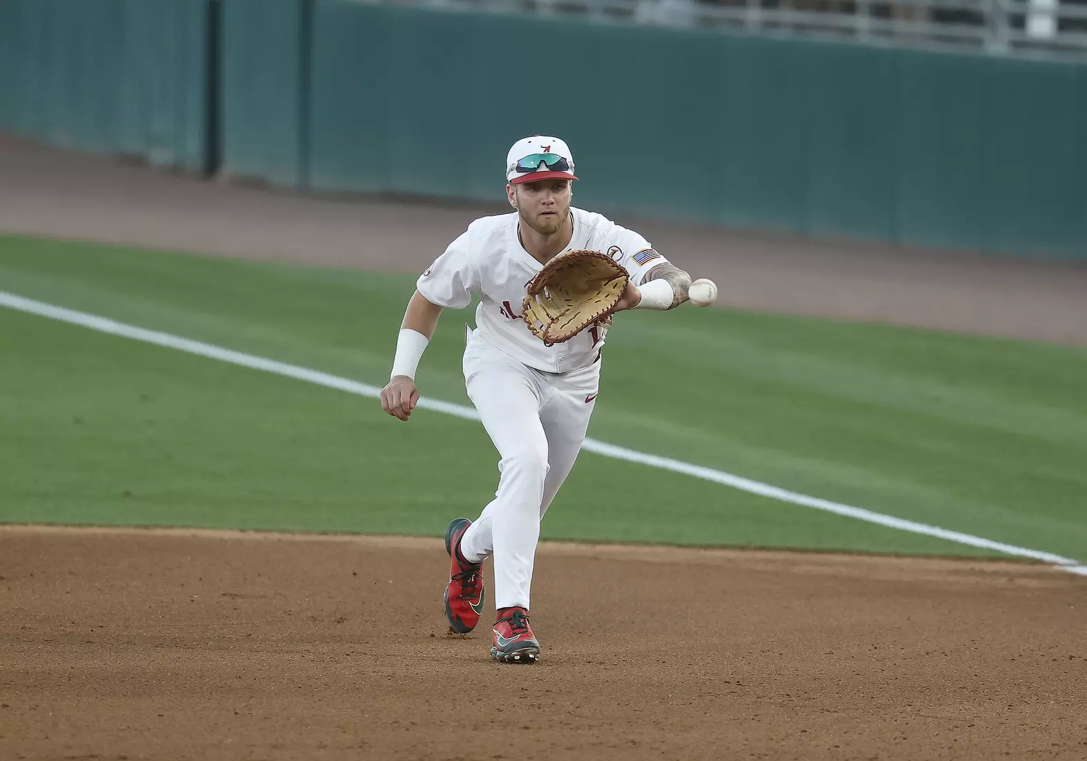 Alabama Baseball Player Luke Vaughn (13) in action against Ole Miss at Sewell-Thomas Stadium in Tuscaloosa, AL on Thursday, May 14, 2026.