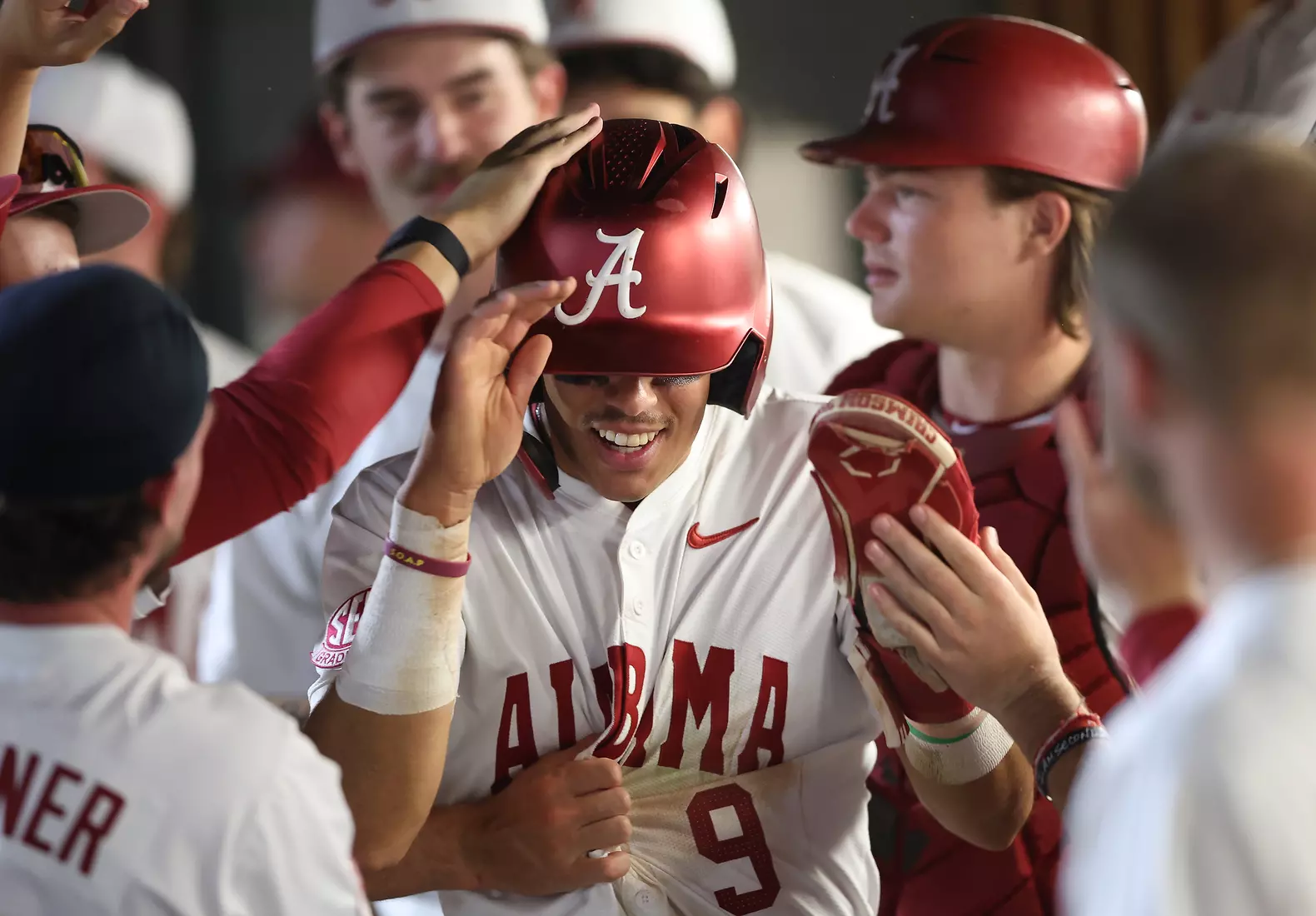 Alabama Baseball Player Bryce Fowler (9) celebrates with his teammates against Ole Miss at Sewell-Thomas Stadium in Tuscaloosa, AL on Thursday, May 14, 2026.