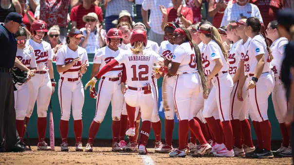 Audrey Vandagriff (12) celebrates with teammates at home plate after a home run vs. USC Upstate (May 15, 2026)