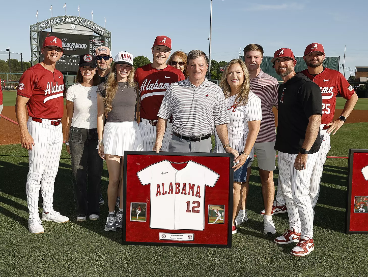 Alabama Baseball Player JT Blackwood (12) celebrates Senior Day with his coaches and family prior to taking on Ole Miss at Sewell-Thomas Stadium in Tuscaloosa, AL on Friday, May 15, 2026.