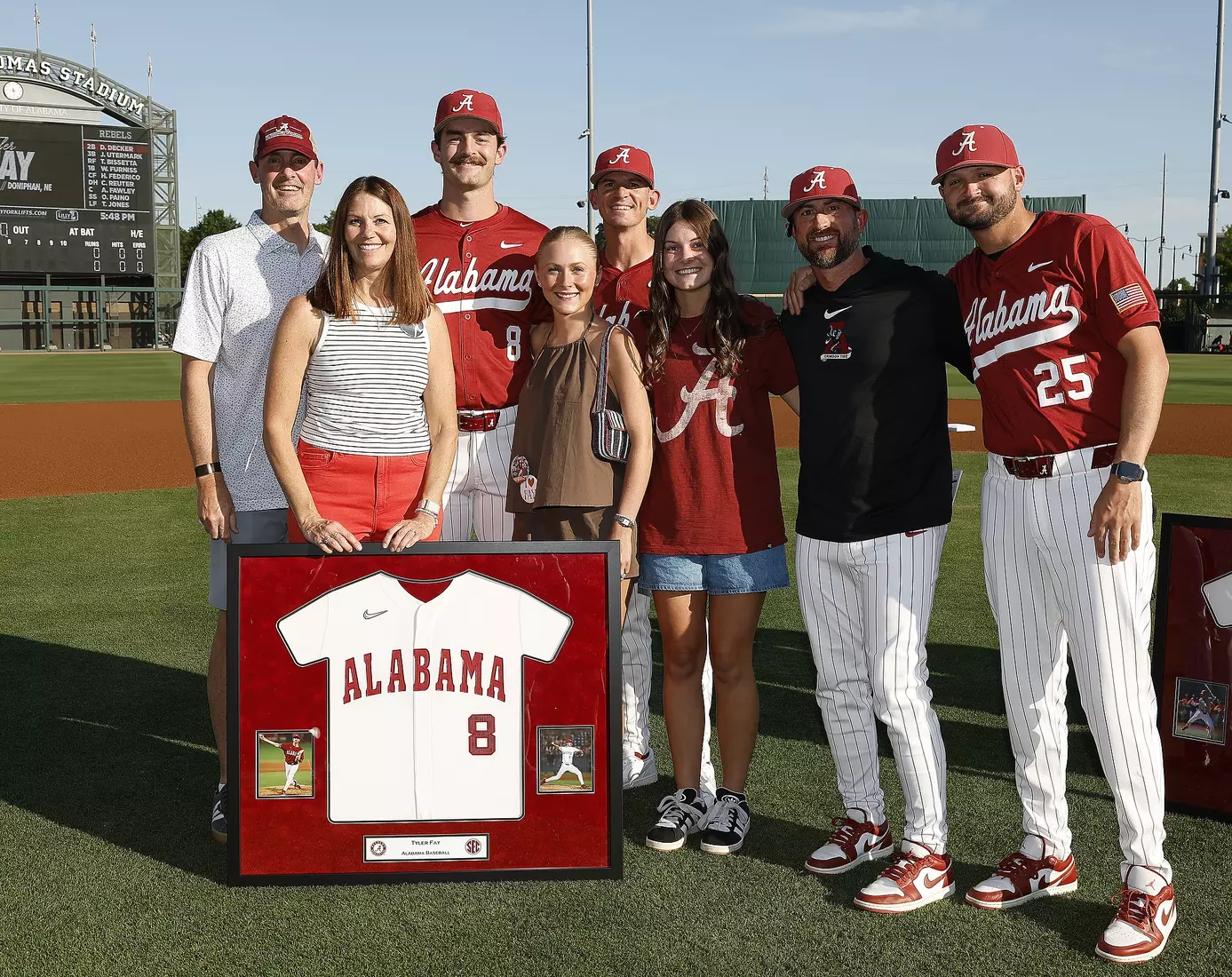 Alabama Baseball Player Tyler Fay (8) celebrates Senior Day with his coaches and family prior to taking on Ole Miss at Sewell-Thomas Stadium in Tuscaloosa, AL on Friday, May 15, 2026.