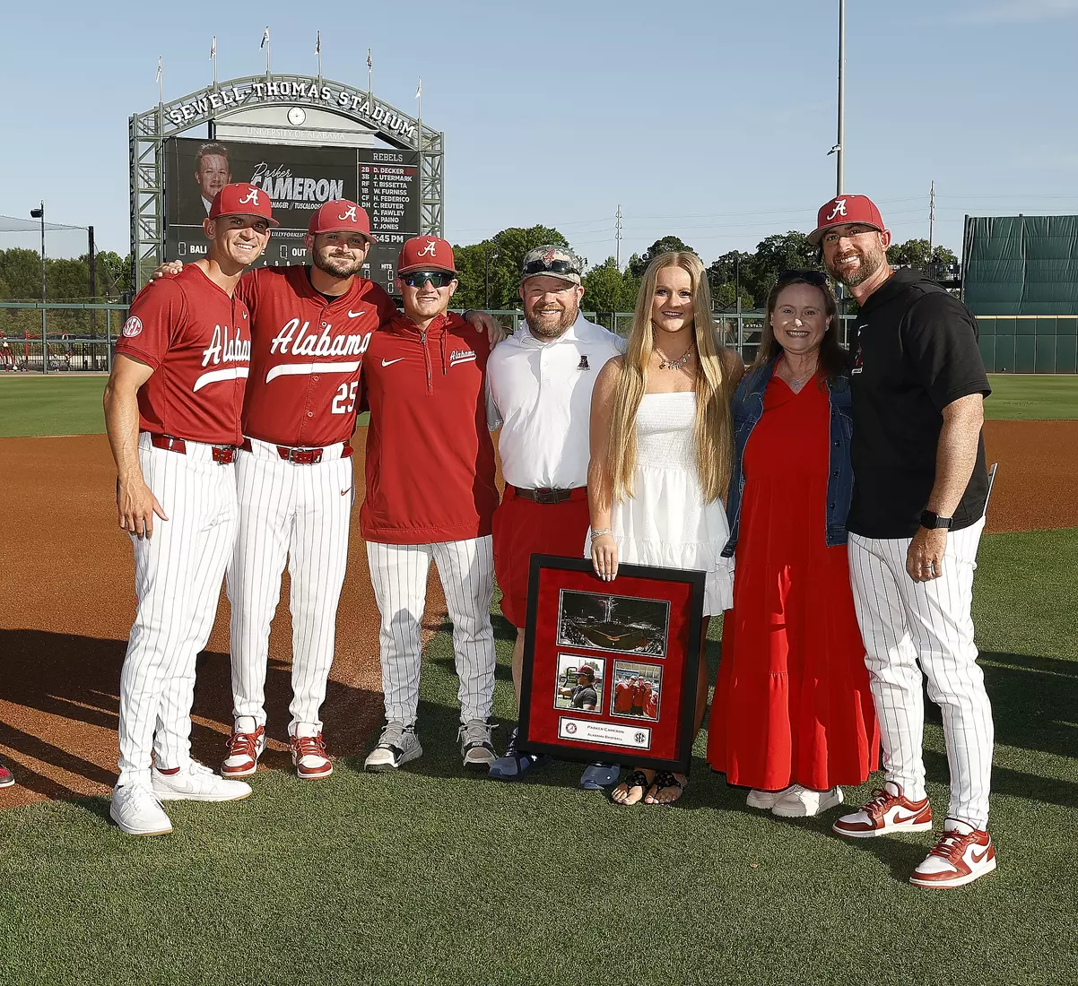 Alabama manager Parker Cameron celebrates Senior Day with his coaches and family prior to taking on Ole Miss at Sewell-Thomas Stadium in Tuscaloosa, AL on Friday, May 15, 2026.