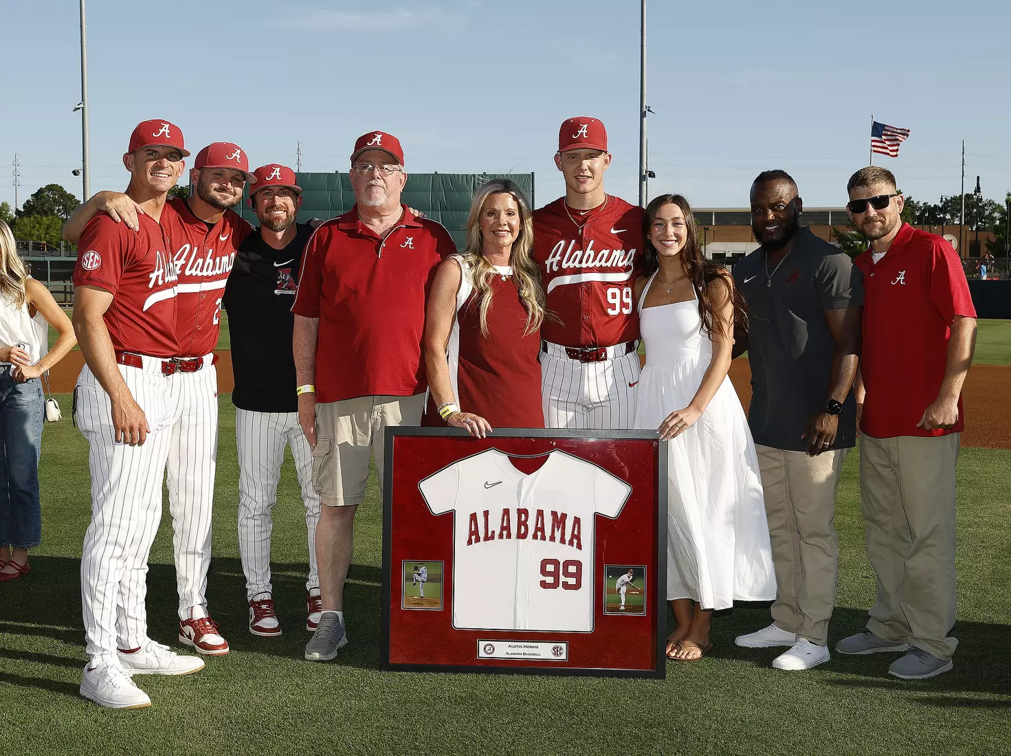 Alabama Baseball Player Austin Morris (99) celebrates Senior Day with his coaches and family prior to taking on Ole Miss at Sewell-Thomas Stadium in Tuscaloosa, AL on Friday, May 15, 2026.