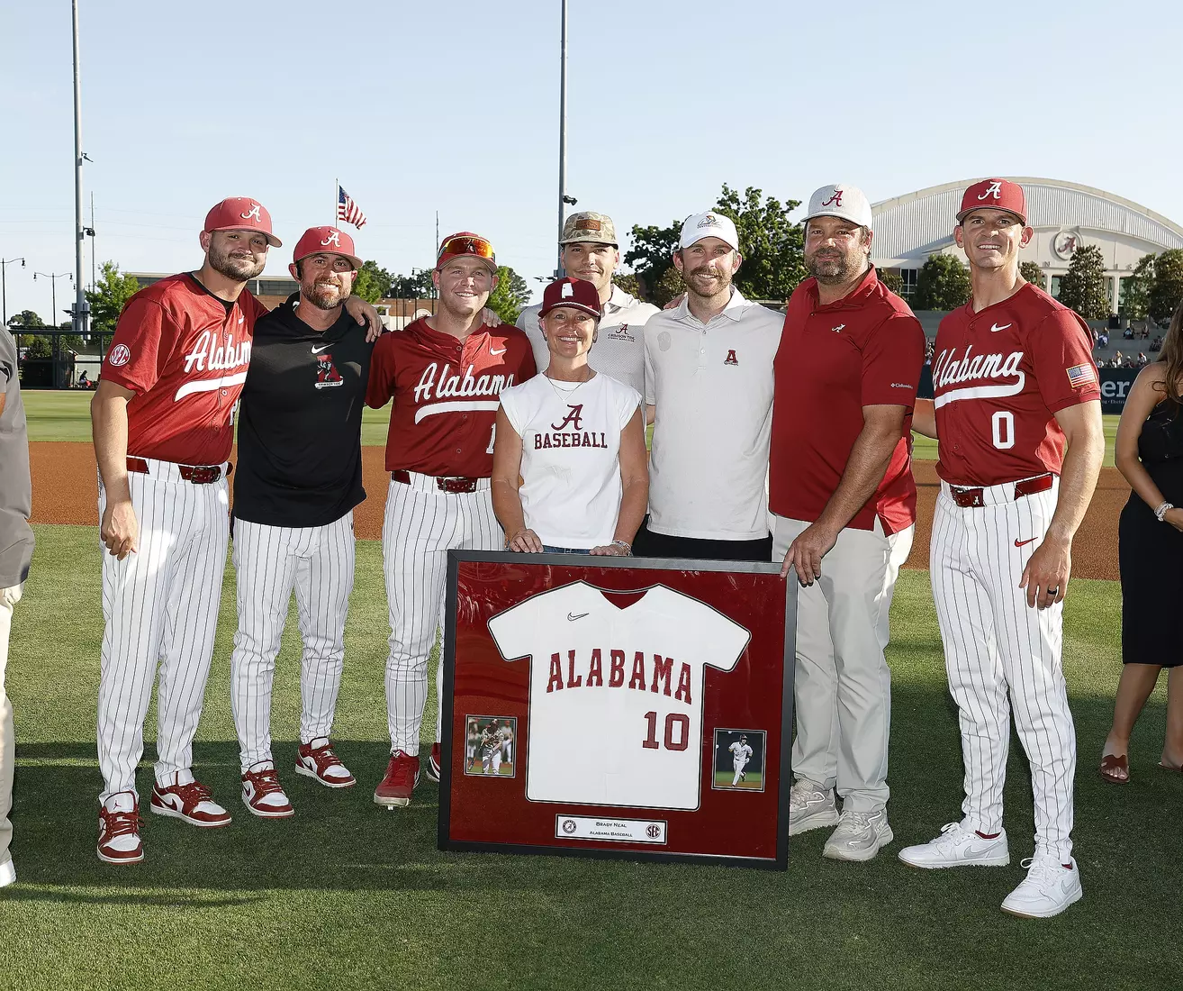 Alabama Baseball Player Brady Neal (10) celebrates Senior Day with his coaches and family prior to taking on Ole Miss at Sewell-Thomas Stadium in Tuscaloosa, AL on Friday, May 15, 2026.