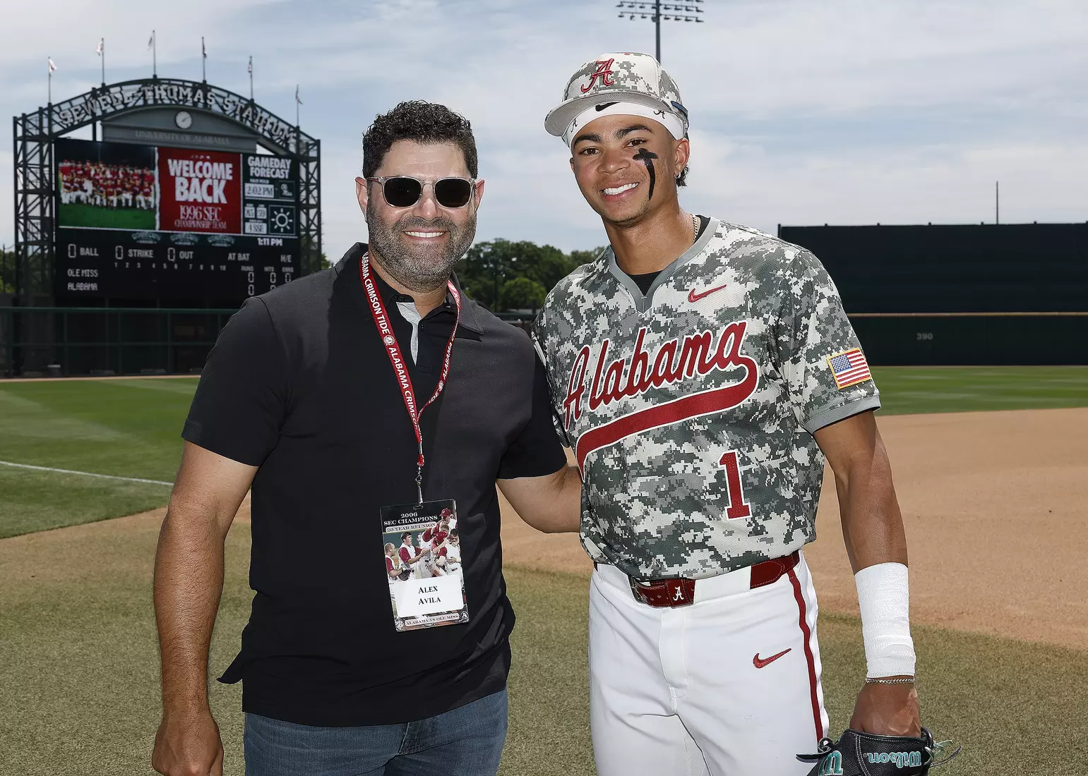 Alex Avila and Alabama Baseball Player Justin Lebron visit during pre game against Ole Miss at Sewell-Thomas Stadium in Tuscaloosa, AL on Saturday, May 16, 2026.