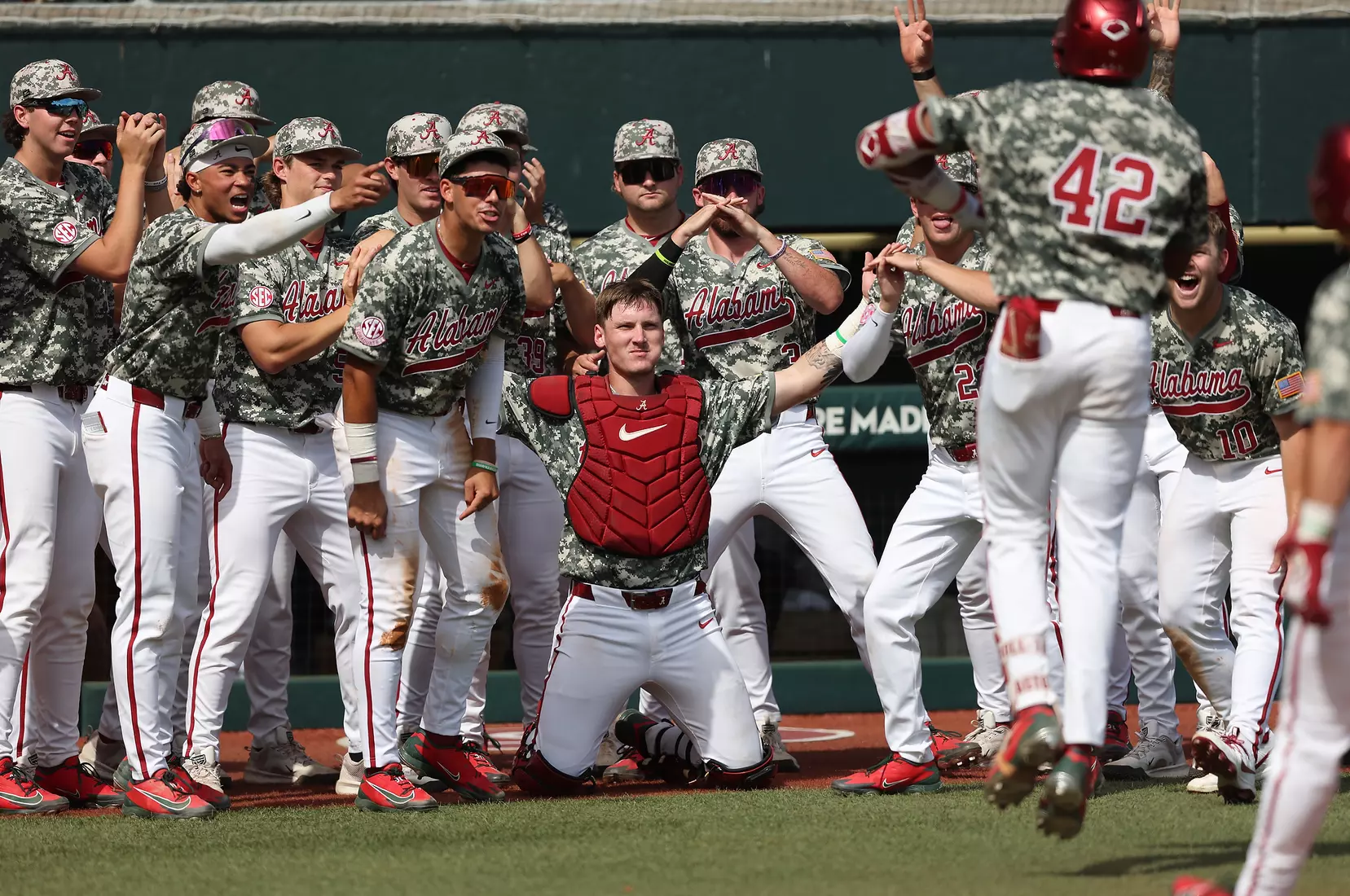 The University of Alabama Baseball Team and Eric Hines (42) celebrate against Ole Miss at Sewell-Thomas Stadium in Tuscaloosa, AL on Saturday, May 16, 2026.