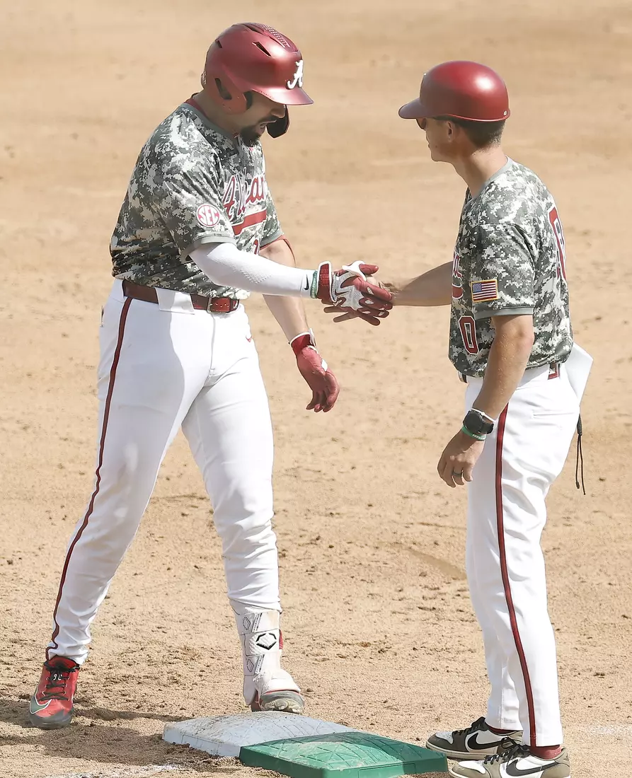 Alabama Baseball Player Jason Torres (32)
and Alabama Baseball Recruiting Operations Assistant Garrett Wood in action against Ole Miss at Sewell-Thomas Stadium in Tuscaloosa, AL on Saturday, May 16, 2026.
