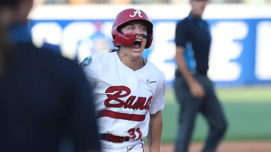 Alexis Pupillo yells after hitting a home run vs. UCLA at the WCWS (May 28, 2026)