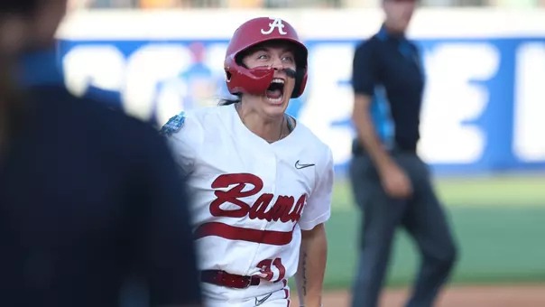 Alexis Pupillo yells after hitting a home run vs. UCLA at the WCWS (May 28, 2026)