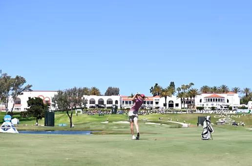 William Jennings hits his shot on the 18th hole overlooking the Omni La Costa