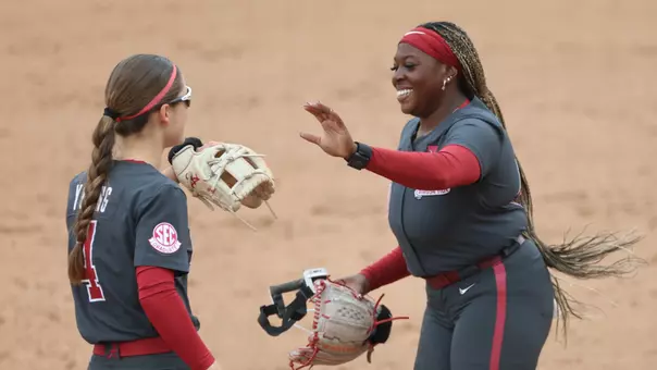 Jena Young (4) high fives Vic Moten (00) vs. South Carolina (May 1, 2026)