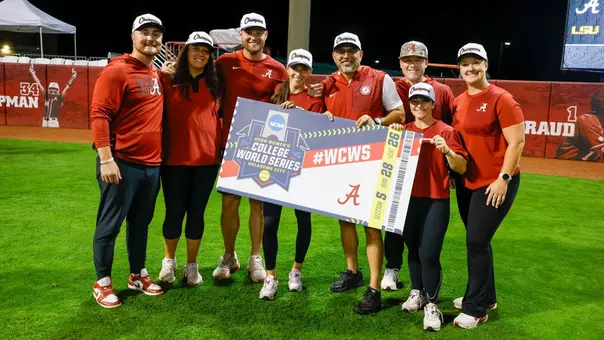 Alabama softball coaches and support staff on the field after Super Regionals (May 23, 2026)