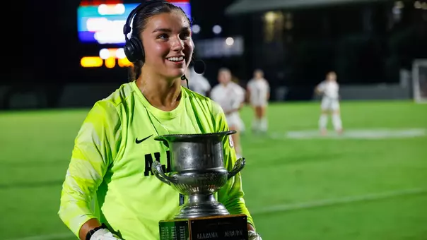Madi Munguia (0) holds the Iron Bowl of Soccer trophy while giving a postgame interview (Sept. 14, 2026)