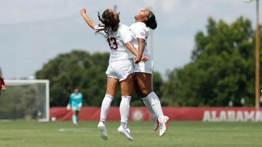 Kennedy Garcia (15) and Melina Rebimbas (13) celebrate after a goal vs. Harvard (Sept. 6, 2026)