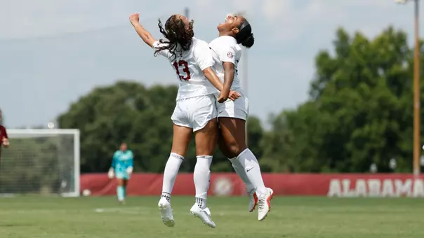 Kennedy Garcia (15) and Melina Rebimbas (13) celebrate after a goal vs. Harvard (Sept. 6, 2026)