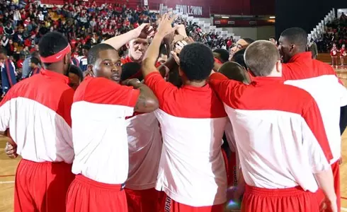Men's Basketball Team Huddle