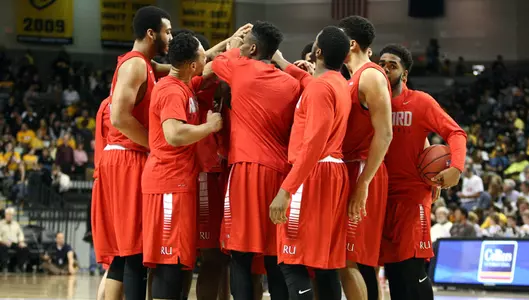 Men's basketball team huddle