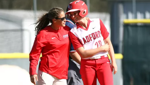 Kayla Bishton and Coach Morales