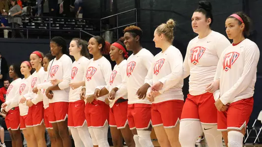 Team huddle for anthem at ETSU 2019