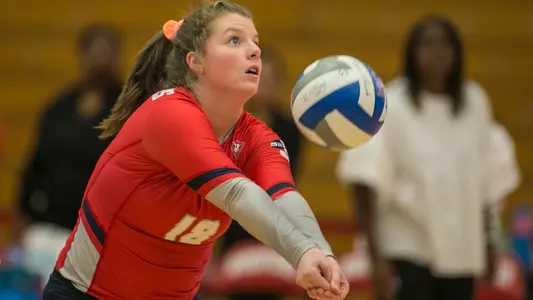 Grace Green digging at Radford Invitational 2019