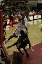 Men's Hoop Gets Past Harvard, 75-66 Image