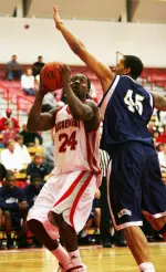 Men's Basketball Wins Fourth Straight, 77-69 Image