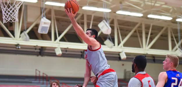 Men's Basketball Rallies Late But Falls To Holy Cross In Home Opener Image