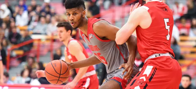 Men's Basketball Falls to Dartmouth, 82-73, Despite Career-High 19 Points from Spellman Image