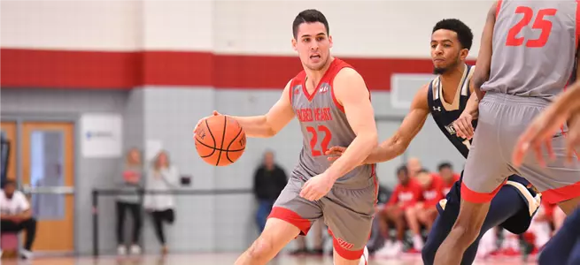 Men's Basketball Overcomes Slow Start, Downs Central Connecticut 80-66 Image