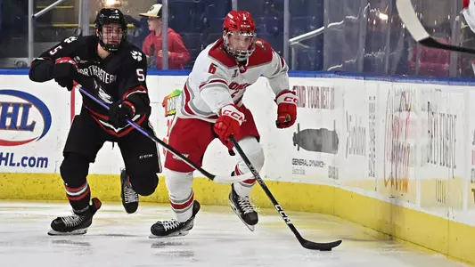 Logan Britt plays the puck against Northeastern on Dec. 6, 2022.